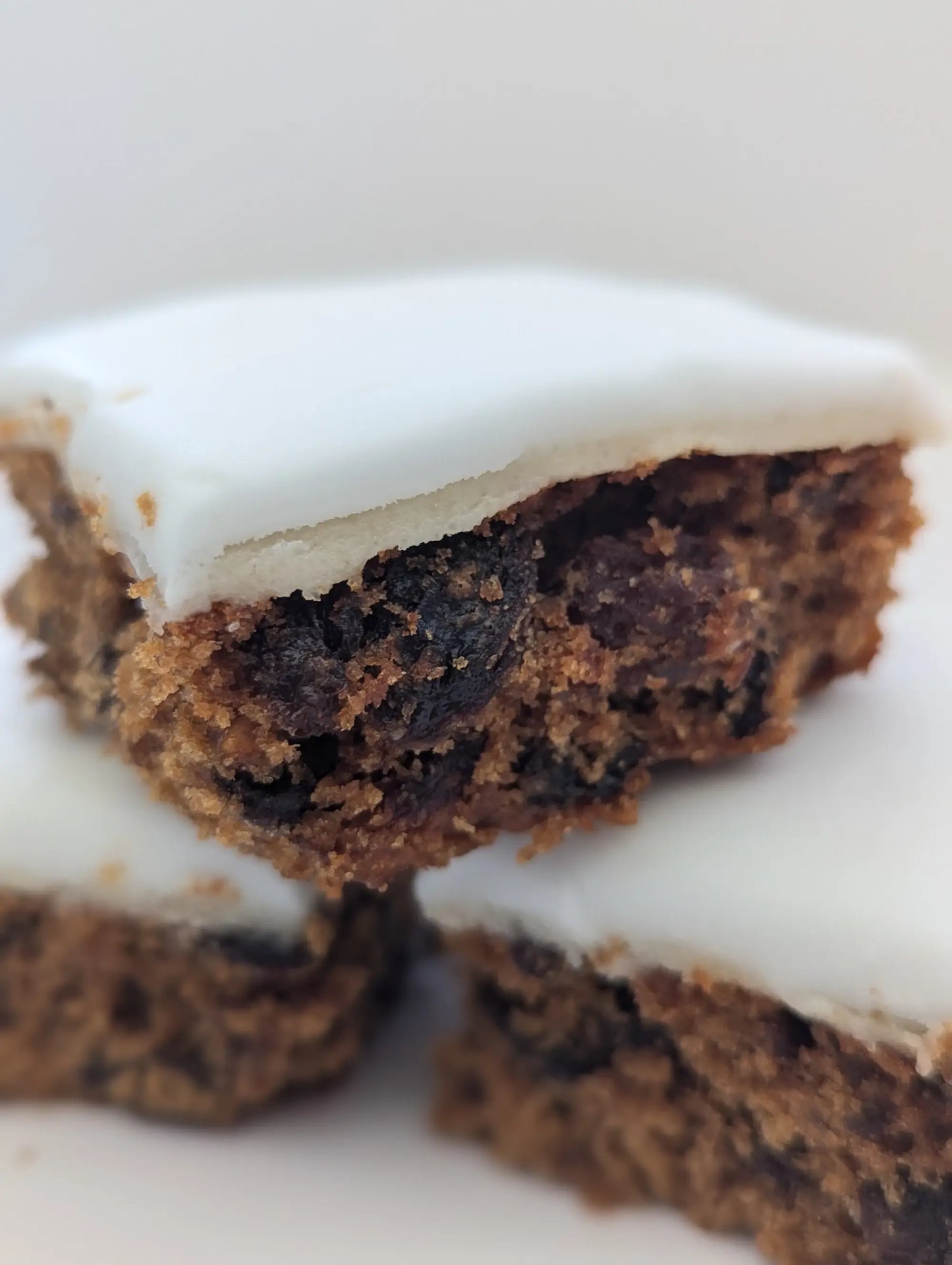 Close up of an iced christmas cake with marzipan